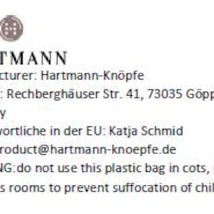 May include: A white plastic bag with the text "HARTMANN" and other German text. The bag has a warning about suffocation hazards for children. The bag is from Hartmann-Kn&ouml;pfe, a manufacturer based in Germany.