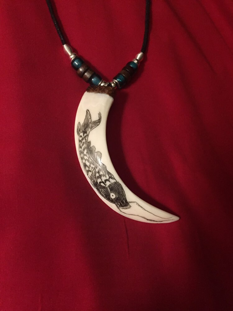 Boar tusk hotsell necklace for sale