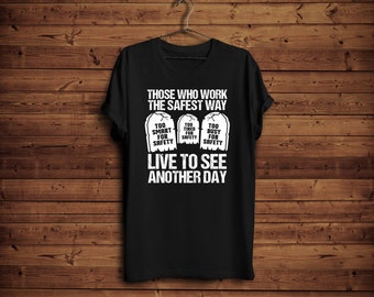 May include: Black t-shirt with a safety message that reads "Those who work the safest way... Too smart for safety, Too tired for safety, Too busy for safety... Live to see another day."
