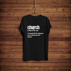 May include: Black t-shirt with white text that reads "church CHerCH/ (n) A hospital for sinners, not a museum for saints."