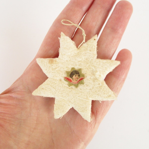 Antique spun cotton double Angel face Star Christmas tree ornament. Christmas tree decoration. Visage d'ange étoile ornement d'arbre de Noël