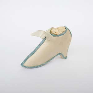 Antique shoe boot shaped silk covered needle pin cushion. Sewing. Collectible
