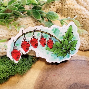 May include: A sticker featuring a watercolor illustration of a vine with five red heart-shaped flowers. The vine is green and has leaves. The background is a light blue watercolor wash.
