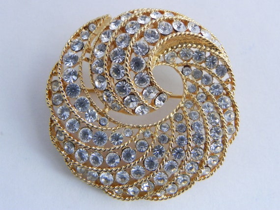 Broche Dorado Remolino Diamante