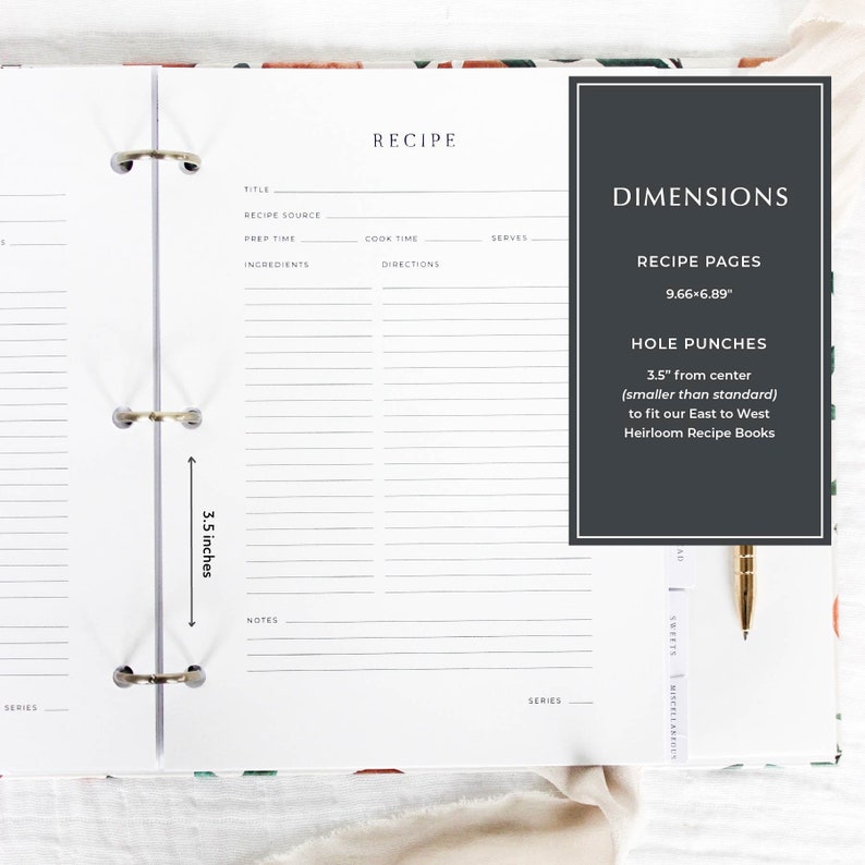 May include: A white recipe book with a black and white floral design on the cover. The book is open to a blank recipe page with lines for writing. The book is 9.66 inches by 6.89 inches and has 3.5 inch holes for a binder.