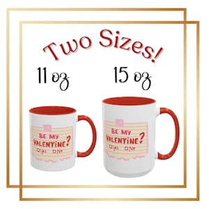 May include: Two red and white coffee mugs with a Valentine's Day design. The mugs are available in two sizes: 11 oz and 15 oz. The design features a pink note with the text "Be My Valentine?" and a check box with the options "Yes" and "No".