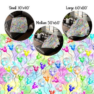 May include: A colorful fleece blanket with a watercolor pattern of Mickey Mouse balloons. The blanket is shown in three sizes: small (30" x 40"), medium (50" x 60"), and large (60" x 80").