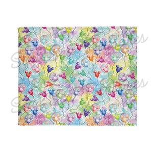May include: A colorful fabric with a repeating pattern of Mickey Mouse shaped balloons in various colors against a watercolor background.