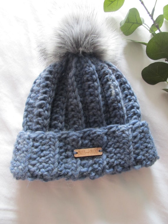 pale blue bobble hat