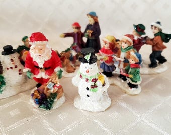 Miniature village Victorian Poly stone winter scene figurines, seven, tiny village people,