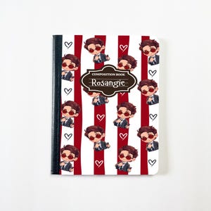 May include: Composition notebook with a red and white striped design. The notebook features illustrations of a cartoon character wearing sunglasses and a suit, along with white hearts. The notebook has the text "COMPOSITION BOOK" and "Rosangie".