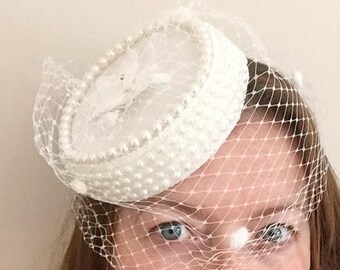 Bridal pillbox hat , wedding, vintage inspired,50's, pearl detail and birdcage veil.