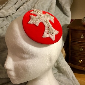 Red velvet fascinator for weddings , special occasions , New Year&#39;s Eve, horse racing or christmas.Striking diamanté and beaded cross design