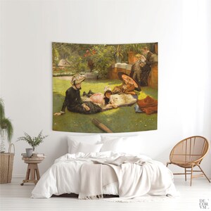 May include: A tapestry featuring a vintage painting of a family picnic in a garden. The artwork depicts figures in period clothing, seated on a blanket under a parasol. The scene is set on a green lawn with trees and flowers in the background.