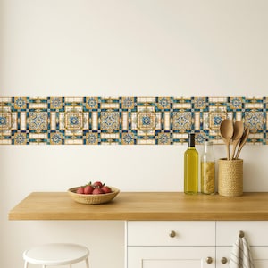 May include: A decorative border of repeating blue, gold, and white patterned tiles. The tiles are above a wooden countertop with a woven basket of strawberries, a white stool, and kitchen utensils.