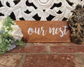 Our nest wood sign