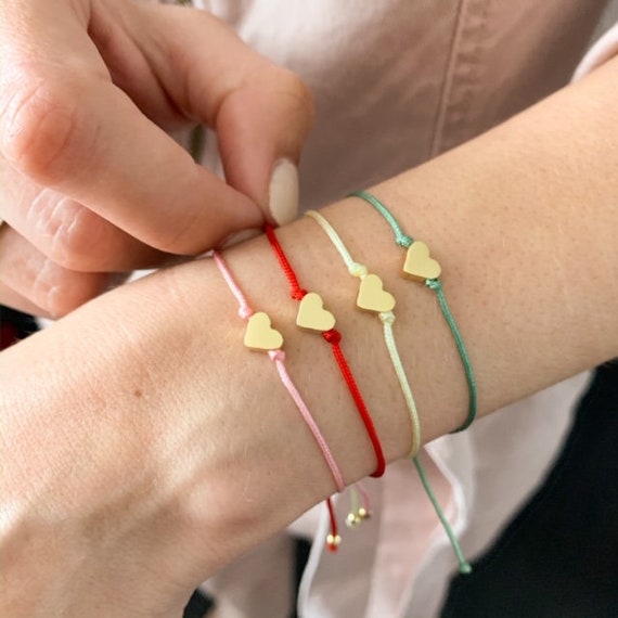 WOVEN FRIENDSHIP BRACELET W/CHARMS LIGHT ROSE WOVEN FRIENDSHIP BRACELET W/CHARMS LIGHT ROSE