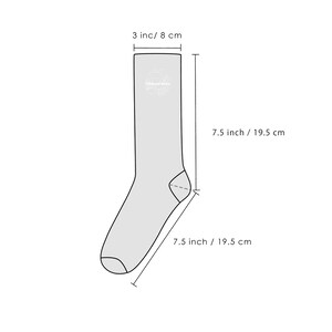 May include: A diagram showing the measurements of a pair of socks. The socks are 7.5 inches or 19.5 centimeters long and 3 inches or 8 centimeters wide.