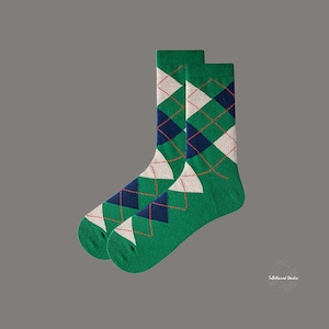 May include: A pair of green, white, and navy blue socks with a diamond pattern.