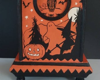 All hand painted vintage Halloween art from old crepe paper on a wooden no clock storage clock