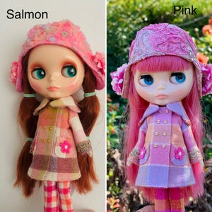 May include: Two dolls with pink and purple plaid coats and pink and white hats. The doll on the left has red hair and the doll on the right has pink hair. The text "Salmon" is above the left doll and the text "Pink" is above the right doll.