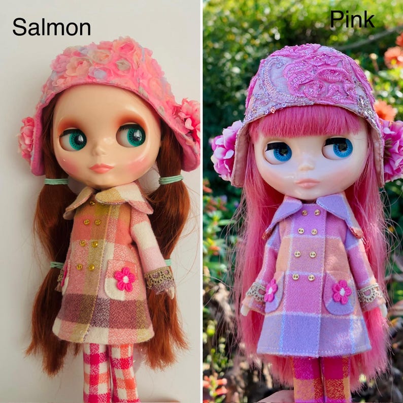 May include: Two dolls with pink and purple plaid coats and pink and white hats. The doll on the left has red hair and the doll on the right has pink hair. The text "Salmon" is above the left doll and the text "Pink" is above the right doll.