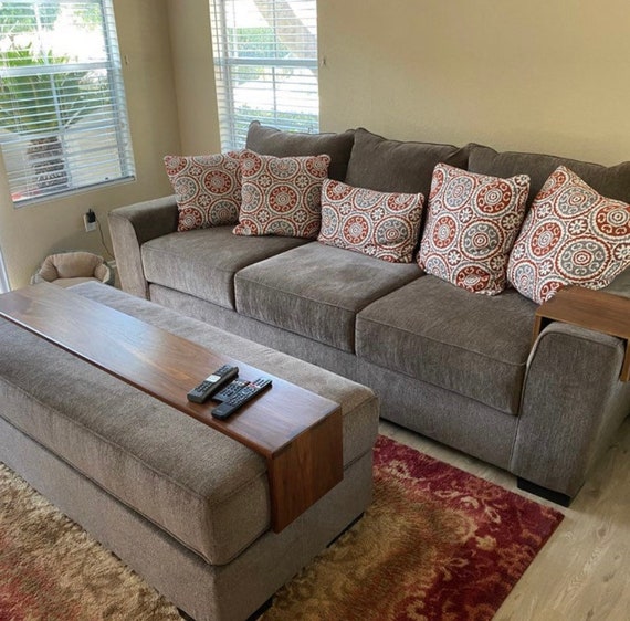 Ottoman coffee table with slide outlet