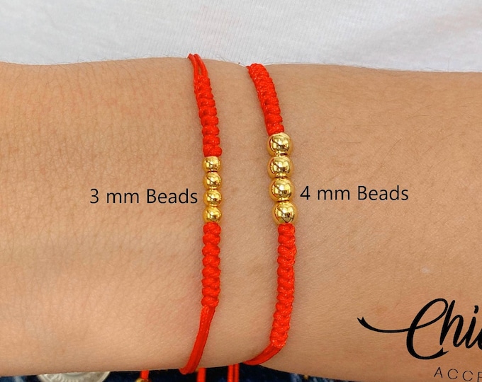 Red String Protection Amulet – Handmade Bracelet with Gold Accents for Strength and Luck