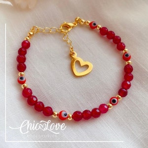 Red Agate & Evil Eye Bracelet – Protection and Inner Strength Accessory.