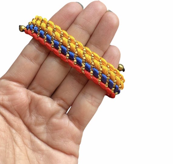 Woven Colombian Bracelet – Handmade Symbol of Pride & Roots
