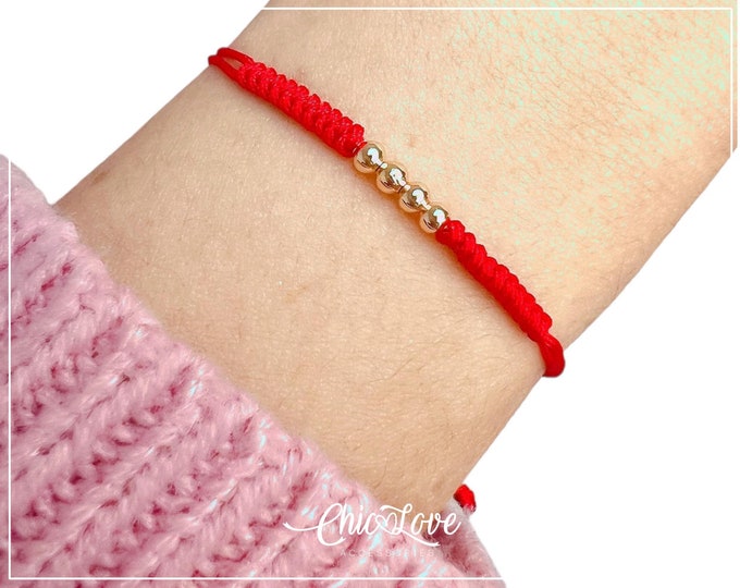 Red String Protection Amulet – Handmade Bracelet with Gold Accents for Strength and Luck