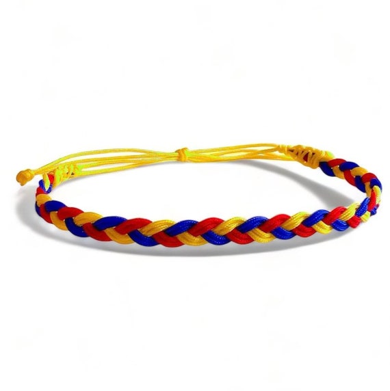 Braided Roots – Colombian Bracelet in Flag Colors