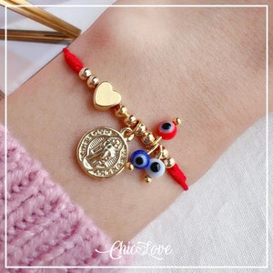 Saint Benedict Red String Bracelet with Evil Eye – Spiritual Protection Amulet for Strength and Energy Balance.
