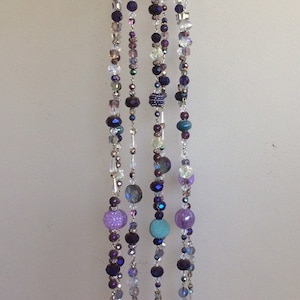 Peacock colors suncatcher