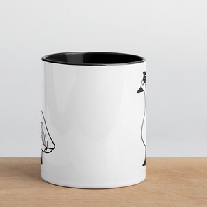 graduation era silly goose 2 tone mug black and white ceramic mug with graphic printed on both sides.