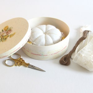 Gift set pincushion with box of colorful roses ready for shipping
