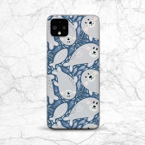 May include: A blue phone case with a pattern of gray seals and blue fish. The case has a cutout for the camera lens.