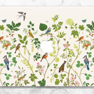 May include: A white laptop skin with a floral pattern featuring various birds, including blue jays, robins, and sparrows. The design is reminiscent of a vintage botanical illustration.