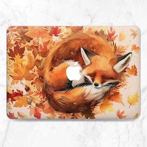 May include: A watercolor illustration of a curled up orange fox sleeping on a bed of autumn leaves. The fox has its eyes closed and its tail wrapped around its body. The leaves are in shades of orange, yellow, and brown.