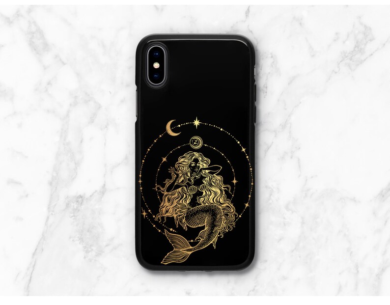 May include: Black phone case with a gold mermaid design and celestial accents. The mermaid is surrounded by a circle of stars and moons.
