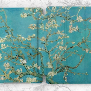 May include: A blue and green painting of a blooming almond tree with white flowers. The painting is a reproduction of a famous artwork by Vincent van Gogh.