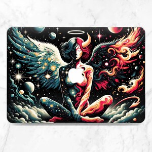 May include: A laptop skin featuring a colorful illustration of a figure with angel wings and devil horns, surrounded by stars and planets. The figure is sitting with legs crossed, and the wings are spread out. The background is a dark blue with a halo above the figure's head.