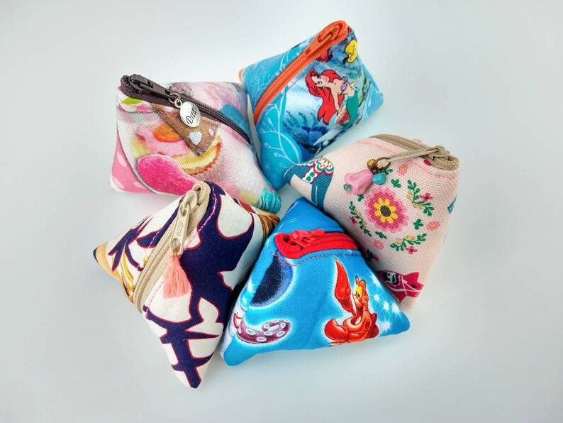 Triangle pyramid zipper pouch for coins earphones chargers etc; no raw edges exposed inside