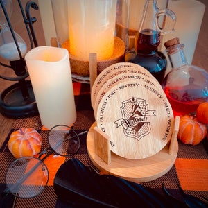 Witch and Wizard&#39;s Magical Houses Bamboo Coaster and Holder Set