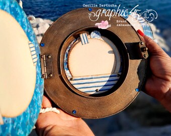 Tutorial mini album Graphic 45 Ocean Blue. Album a forma di oblò in PDF con video. Scrapbooking Cecilia