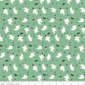 May include: A repeating pattern of white ghosts wearing black witch hats, black bats, crescent moons, and stars on a light green background. The fabric design is suitable for Halloween-themed crafts and projects.