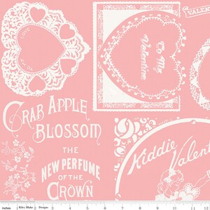 May include: Pink fabric with a white design featuring a heart-shaped lace doily, a floral design, and text that reads "Crab Apple Blossom", "The New Perfume of the Crown", and "Kiddie Valentine".