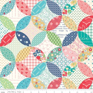 May include: A colorful patchwork fabric with a circular design. The pattern features various fabrics in shades of red, blue, green, and pink, with floral, polka dot, and striped patterns. The fabric has text that reads "MACHINE WASH NOR" and "Riley Blake Designs".