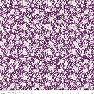 May include: Purple fabric with a white floral pattern. The fabric is covered in small white flowers with pink centers and green stems.