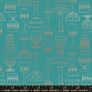 May include: Teal fabric with a white and gold pattern of various glassware, including wine glasses, decanters, and goblets. The fabric has a repeating pattern and includes the text "RUBY STAR SOCIETY".